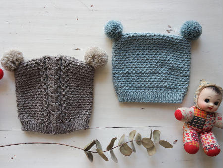 cappello a maglia pom pom